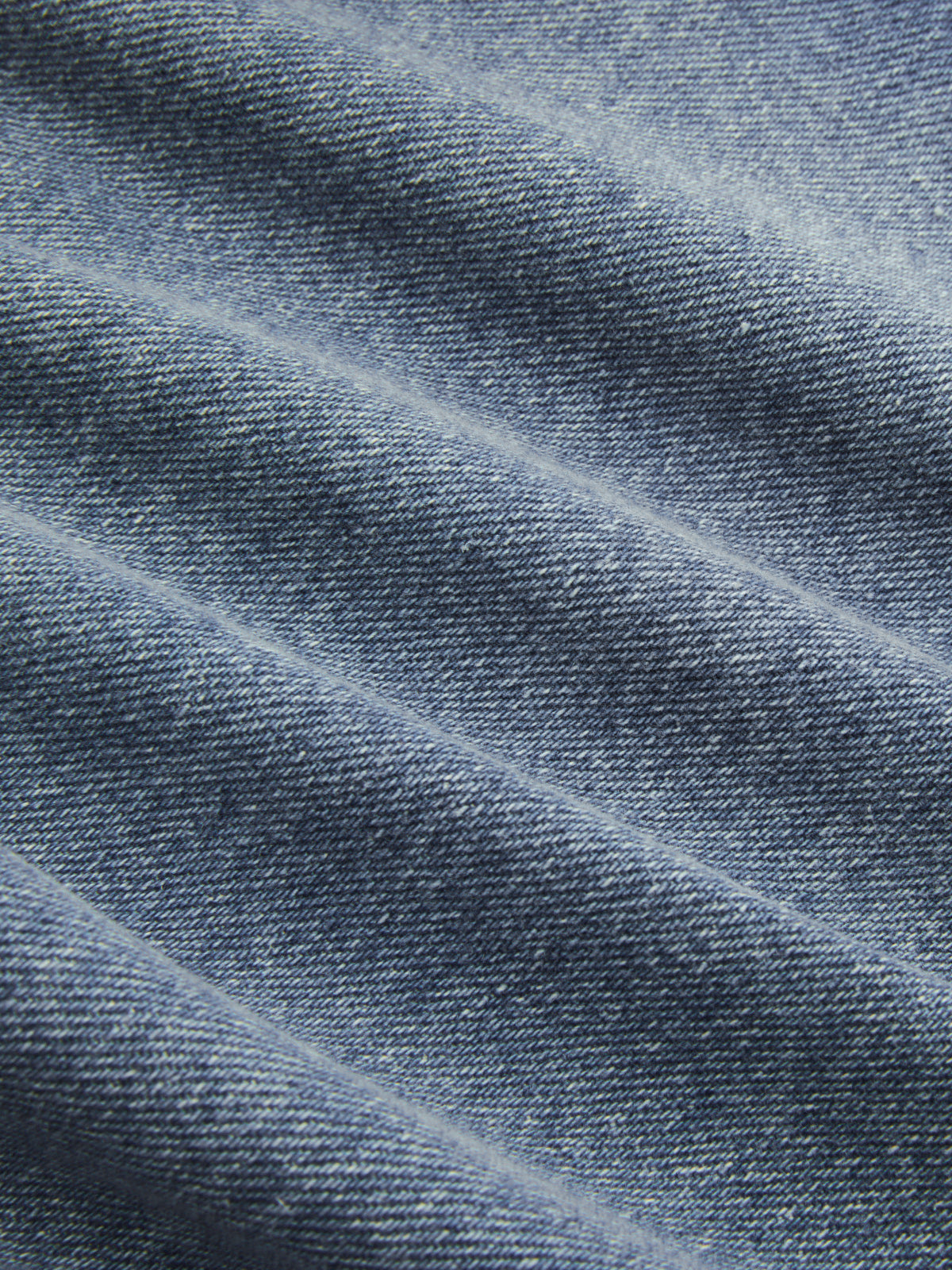 Asymmetric Pleated Denim Mini Skirt