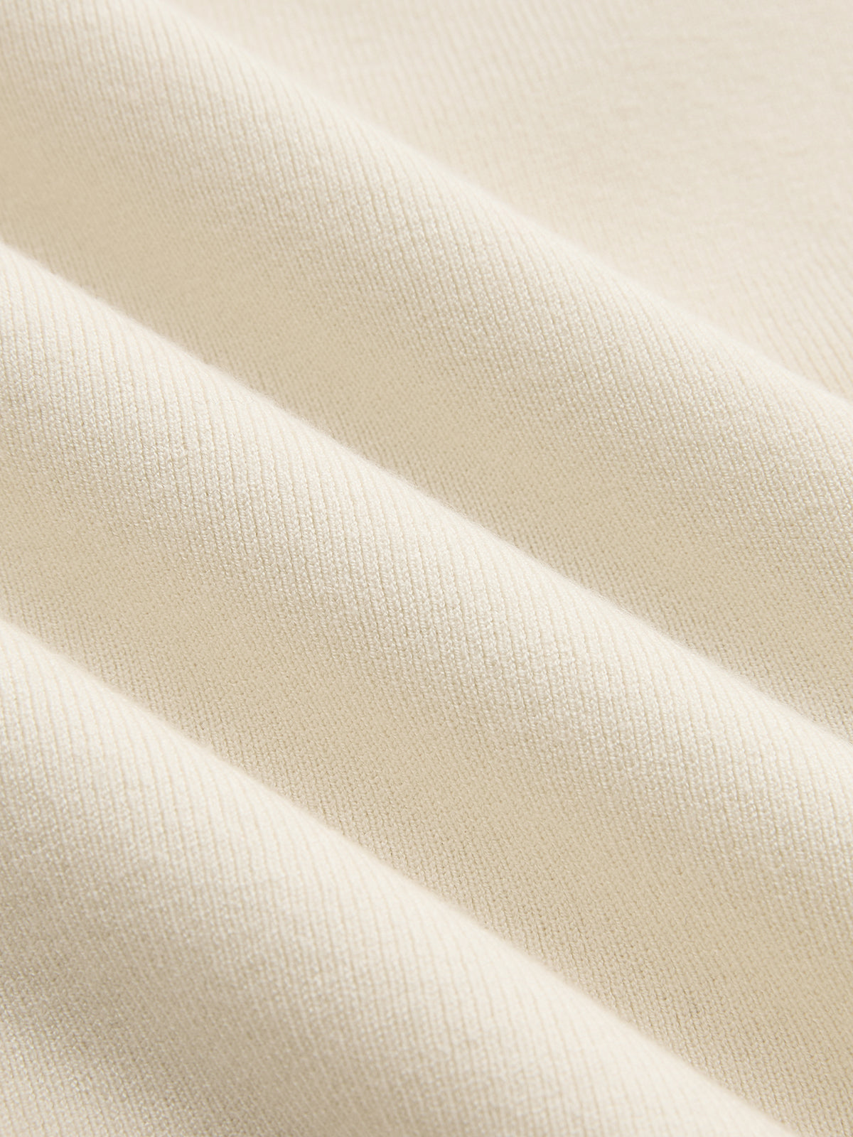 Asymmetric Button Sleeveless Knit Top